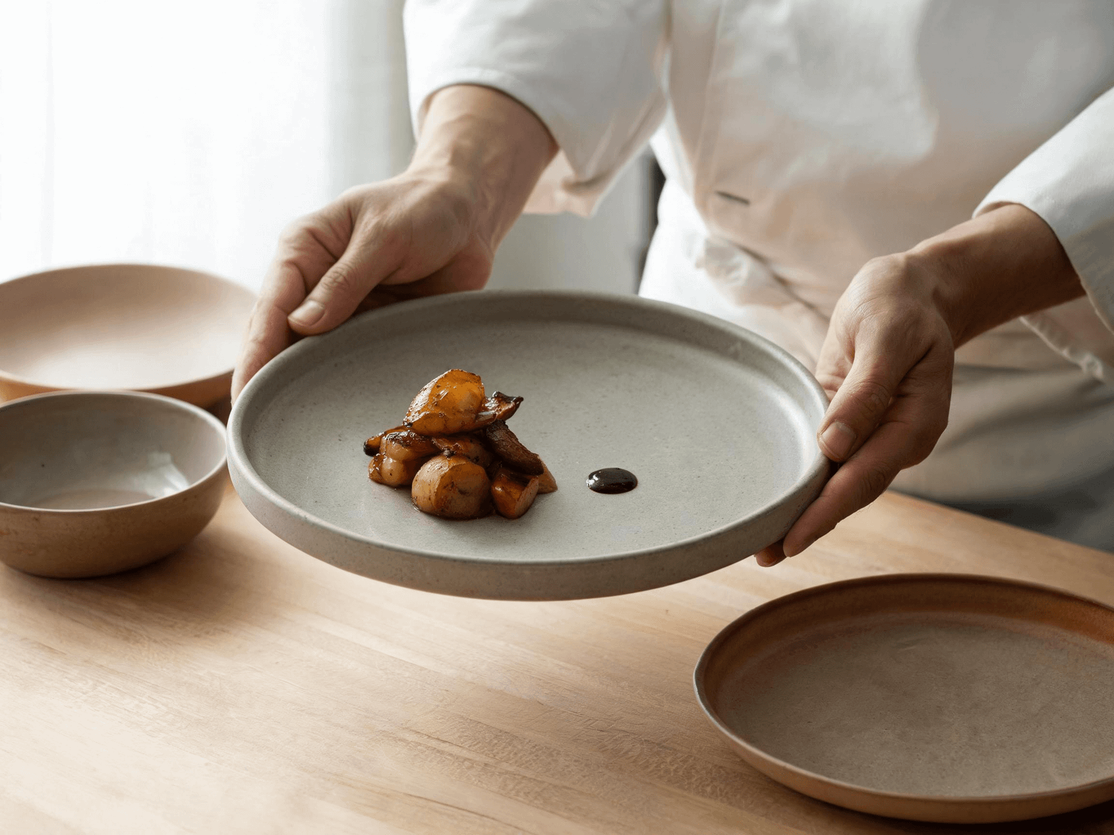 Ceramic tableware being evaluated for restaurant plating and service