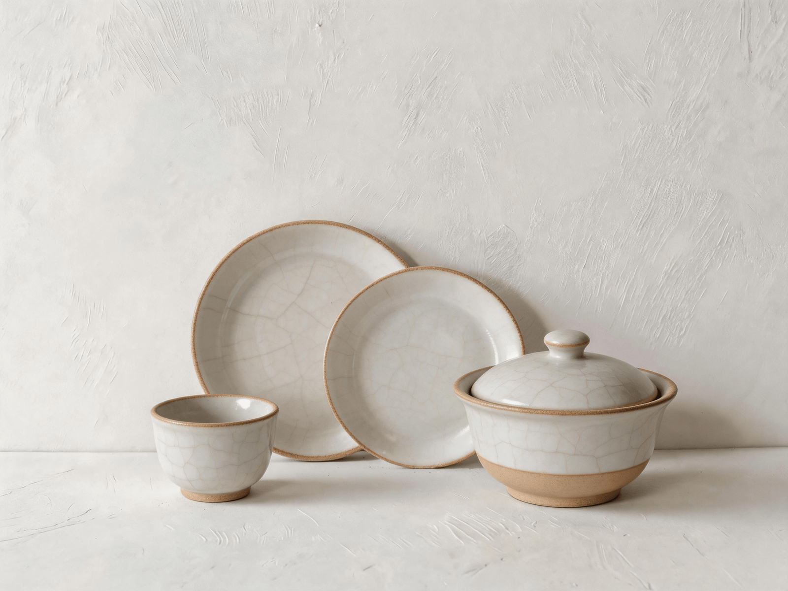 A coordinated Chenlu tableware family showing related plates bowls cup and serving forms